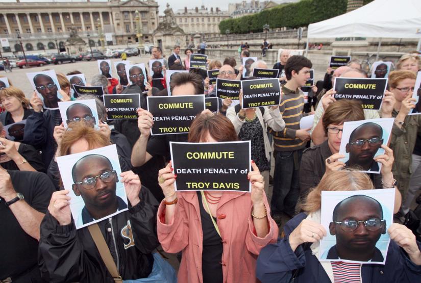 Protesters demand justice for Troy Davis at a demonstration in Paris