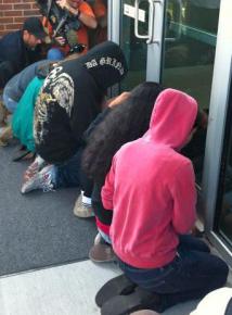 Protesters from the Dream Defenders block the police headquarters in Sanford